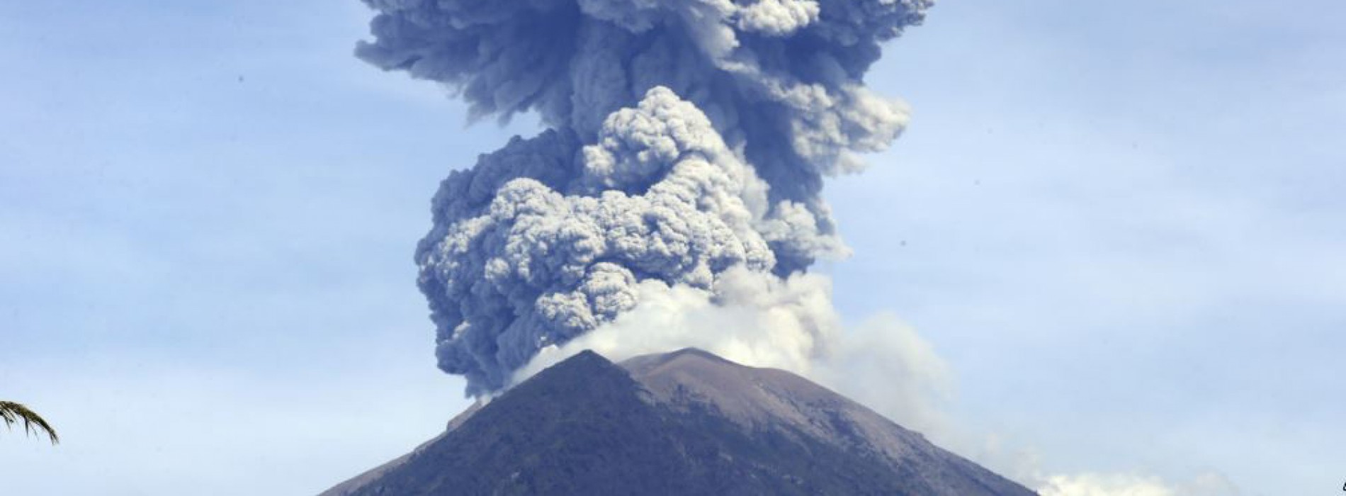 Bali volcano hurls lava and ash, airport unaffected